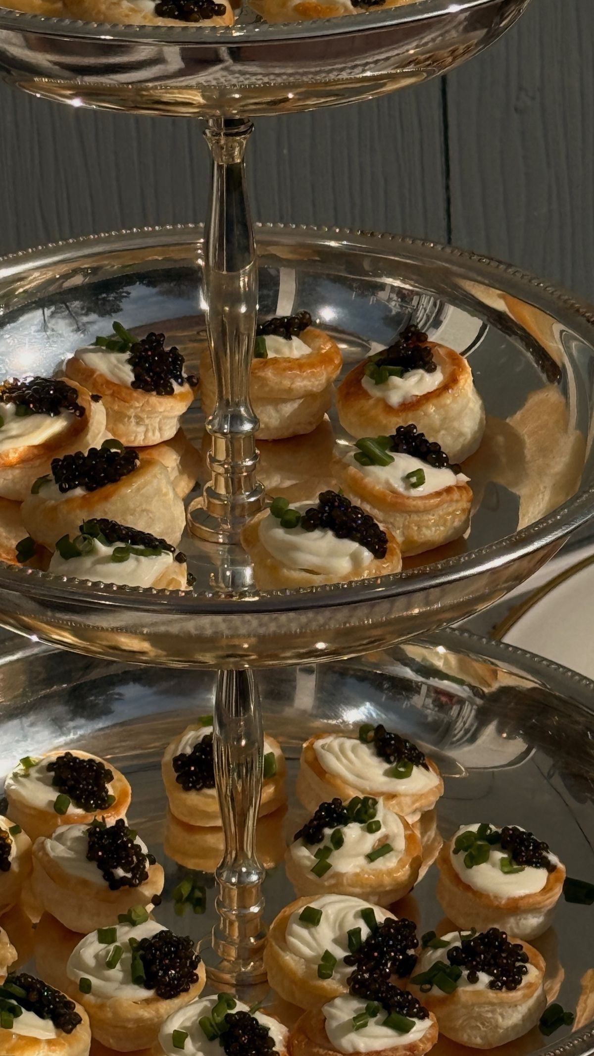 Tiered caviar tower on silver stand
