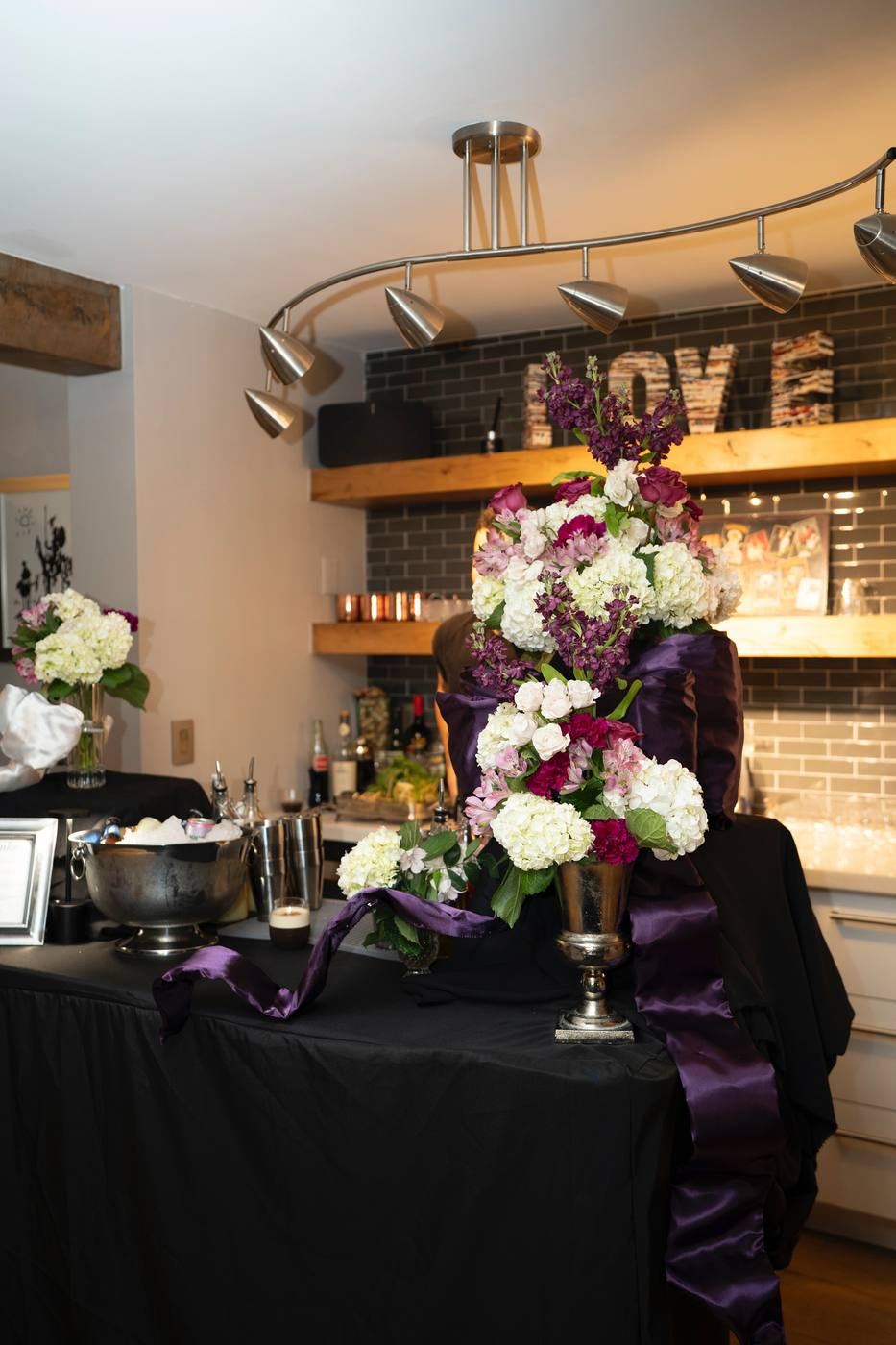 Floral bar arrangement with hydrangeas and roses